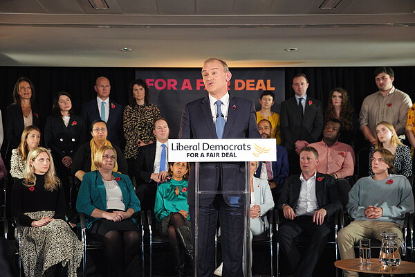 Ed Davey gives speech in front of seated audience